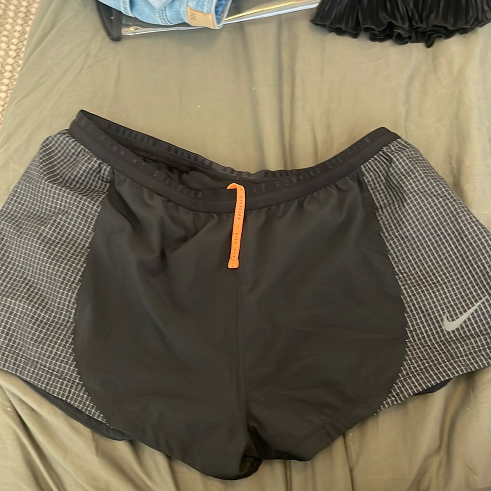 Nike runnning shirts size XL with underwear lining.